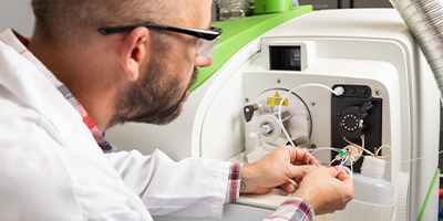 Technician preparing to test water sample