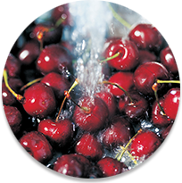 Water pouring onto berries